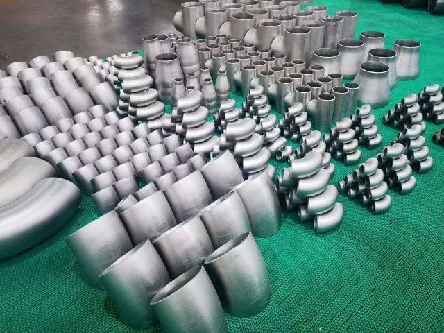 Titanium pipe fittings